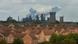 A steel plant in the background of a town in Britain.