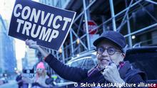 NEW YORK, UNITED STATES - MARCH 30: Demonstrators carry a banner outside Manhattan District Attorney Alvin Bragg's Office, supporting the grand jury that voted against former US President Donald J. Trump for hush money case ahead of the 2016 election in New York, United States on March 30, 2023. Selcuk Acar / Anadolu Agency