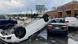 A car is upturned in a Kroger parking lot after a severe storm swept through Little Rock, Ark., Friday, March 31, 2023. A car is upturned in a Kroger parking lot after a severe storm swept through Little Rock, Ark., Friday, March 31, 2023.