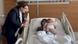 Earthquake survivor mother Yasemin Begdas hugging 3-month-old daughter Vetin in hospital bed as Turkish Family Minister Derya Yanik looks on Earthquake survivor mother Yasemin Begdas hugging 3-month-old daughter Vetin in hospital bed as Turkish Family Minister Derya Yanik looks on