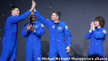 03.04.2023
From left, Jeremy Hansen, Victor Glover, Reid Wiseman and Christina Hammock Koch, celebrate on stage as they are announced as the Artemis II crew during a NASA ceremony naming the four astronauts who will fly around the moon by the end of next year, at a ceremony held in the NASA hangar at Ellington airport Monday, April 3, 2023, in Houston. (AP Photo/Michael Wyke)