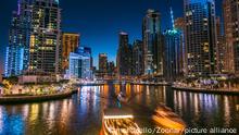 27/11/2019 Modern residential architecture of Dubai Marina, United Arab Emirates. City skyline by night.