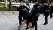 Israeli security forces drag a woman on the grounds of the Al-Aqsa Mosque compound in Jerusalem on April 5, 2023 Israeli security forces drag a woman on the grounds of the Al-Aqsa Mosque compound in Jerusalem on April 5, 2023