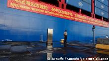 03/12/2018 In this Dec. 3, 2018, photo, a Panama Canal guard stands at attention in front of a Chinese container ship docked at the Panama Canal's Cocoli Locks in Panama City, during an official visit by China's President Xi Jinping and first lady Peng Liyuan. China’s expansion in Latin America of its Belt and Road initiative to build ports and other trade-related facilities is stirring anxiety in Washington. As American officials express alarm at Beijing’s ambitions in a U.S.-dominated region, China has launched a charm offensive, wooing Panamanian politicians, professionals, and journalists. (AP Photo/Arnulfo Franco)