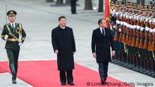 BEIJING, CHINA - NOVEMBER 06: Chinese President Xi Jinping (L) accompanies French President Emmanuel Macron (R) to view an honour guard during a welcoming ceremony outside the Great Hall of the People on November 6, 2019 in Beijing, China. At the invitation of Chinese President Xi Jinping, President Emmanuel Macron of the French Republic will pay a state visit to China from November 4th to 6th. (Photo by Lintao Zhang/Getty Images)