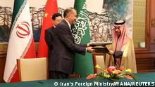 06.04.2023
Iranian Foreign Minister Hossein Amir-Abdollahian and Saudi Arabia's Foreign Minister Prince Faisal bin Farhan Al Saud attend a ceremony to sign a memorandum of understanding in Beijing, China, April 6, 2023. Iran's Foreign Ministry/WANA (West Asia News Agency)/Handout via REUTERS ATTENTION EDITORS - THIS PICTURE WAS PROVIDED BY A THIRD PARTY 
