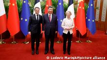 China's President Xi Jinping, center, his French counterpart Emmanuel Macron, left, and European Commission President Ursula von der Leyen meet in Beijing Thursday, April 6, 2023. (Ludovic Marin/Pool Photo via AP)