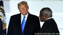 26/10/2020 President Donald Trump looks at Supreme Court Justice Clarence Thomas as he administers the Constitutional oath to Judge Amy Coney Barrett to become a Supreme Court justice, at the White House in Washington, DC on Monday, October 26, 2020. Earlier today Barrett was confirmed by the Senate, 52-48, replacing the late Ruth Bader Ginsburg. PUBLICATIONxINxGERxSUIxAUTxHUNxONLY WDC20201026529 KEVINxDIETSCH