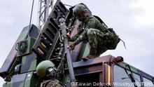 Soldiers of an artillery command of Taiwanese Army take part in a military exercise at an undisclosed location in Taiwan in this handout picture provided by Taiwan Defence Ministry and released on April 9, 2023. Taiwan Defence Ministry/Handout via REUTERS ATTENTION EDITORS - THIS IMAGE WAS PROVIDED BY A THIRD PARTY. NO RESALES. NO ARCHIVES.