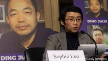 WASHINGTON, DC - FEBRUARY 03: As a photo of her husband Chinese human rights activist Ding Jiaxi is on display in the background, Sophie Luo testifies during a hearing before The Congressional-Executive Commission on China (CECC) at Dirksen Senate Office Building on Capitol Hill on February 3, 2022 in Washington, DC. CECC held a hearing on The Beijing Olympics and the Faces of Repression. Alex Wong/Getty Images/AFP (Photo by ALEX WONG / GETTY IMAGES NORTH AMERICA / Getty Images via AFP)