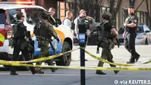 Police deploy at the scene of a mass shooting near Slugger Field baseball stadium in downtown Louisville, Kentucky, U.S. April, 10, 2023. Michael Clevenger/USA Today Network via REUTERS. NO RESALES. NO ARCHIVES. MANDATORY CREDIT
