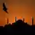 Silhouette of the Hagia Sophia Grand Mosque during sunset in Istanbul