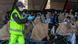 Migrants just arrived in the Southern Italian port of Brindisi receive the first aid Migrants just arrived in the Southern Italian port of Brindisi receive the first aid