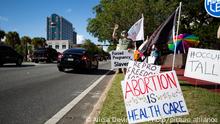 13.04.2023
A small crowd holding signs and waving as cars pass by the Leon County Courthouse, protests Sb 300, which bans abortions after six weeks, Thursday, April 13, 2023. in Tallahassee, Fla. The Republican-dominated Florida Legislature on Thursday approved a ban on abortions after six weeks of pregnancy, a proposal supported by GOP Gov. Ron DeSantis as he prepares for an expected presidential run. (Alicia Devine/Tallahassee Democrat via AP)