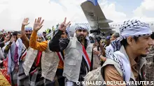 Freed prisoners arrive at Sanaa Airport, amid a prisoner swap between two sides in the Yemen conflict, in Sanaa, Yemen April 14, 2023. REUTERS/Khaled Abdullah