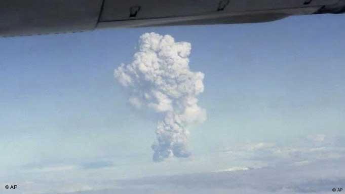 In this image taken from amateur video, smoke from the Grimsvotn volcano, Iceland is seen from a plane Saturday, May 21, 2011. Iceland's most active volcano has started erupting, scientists said Saturday, just over a year after another eruption on the North Atlantic island shut down European air traffic for days, but the impact of this volcanic eruption is not yet known. (AP Photo/Amateur video via APTN) ICELAND OUT, TV OUT