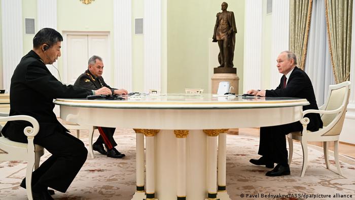 Russian President Putin meets with Russian Defence Minister Shoig