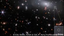 Using first-of-their-kind observations from the James Webb Space Telescope, researchers detected a unique galaxy (inset) Ð highly compact but with star formation still at a rate similar to our much-larger Milky Way Ð existing about 13.3 billion years ago that could help astronomers learn more about galaxies that were present relatively shortly after the Big Bang. ESA/Webb, NASA & CSA, P. Kelly/Handout via REUTERS NO RESALES. NO ARCHIVES