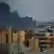 تصاعد الدخان مع استمرار الاشتباكات في العاصمة السودانية في 17 أبريل 2023 بين القوات المسلحة السودانية وقوات الدعم السريع