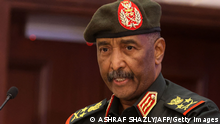 Sudan's Army chief Abdel Fattah al-Burhan speaks following the signature of an initial deal aimed at ending a deep crisis caused by last year's military coup, in the capital Khartoum on December 5, 2022. - The past year has seen near-weekly protests and a crackdown that pro-democracy medics say has killed at least 121, a spiralling economic crisis exacerbated by donors slashing funding, and a resurgence of ethnic violence in several remote regions. Divisions among civilian groups have deepened since the coup, with some urging a deal with the military while others insist on no partnership, no negotiation. (Photo by ASHRAF SHAZLY / AFP) (Photo by ASHRAF SHAZLY/AFP via Getty Images)