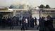 Afghan security stand outside the provincial governor's compound as smoke is seen rising from inside in Taloqan, Takhar province, north of Kabul, Afghanistan, Saturday, May 28, 2011. The German military says its top commander in Afghanistan was wounded Saturday when a suicide bomber attacked a provincial governor's compound in the north of the country. (AP Photo/Ezatullah Pamir) Afghan security stand outside the provincial governor's compound as smoke is seen rising from inside in Taloqan, Takhar province, north of Kabul, Afghanistan, Saturday, May 28, 2011. The German military says its top commander in Afghanistan was wounded Saturday when a suicide bomber attacked a provincial governor's compound in the north of the country. (AP Photo/Ezatullah Pamir)