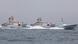 Ships travel through the Strait of Hormuz. Ships travel through the Strait of Hormuz.