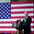 ABD Başkanı Joe Biden, büyük bir ABD bayrağının önünde kürsüden konuşma yapıyor - (19.04.2023)
