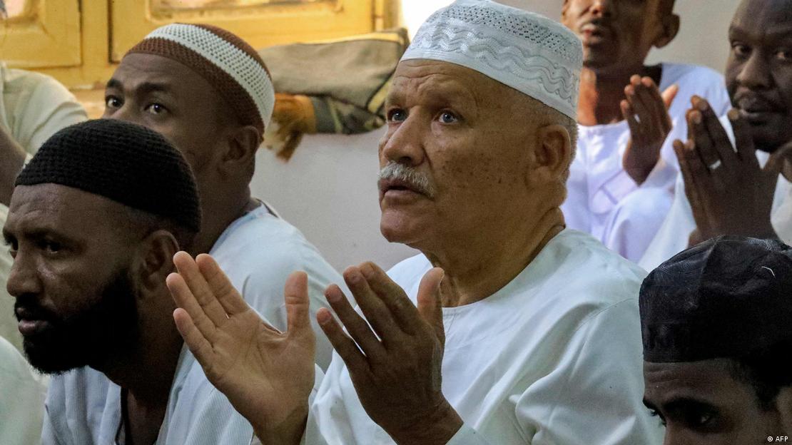 Muslim worshippers pray at al-Hara al-Rabaa Mosque 
