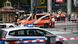 Police and paramedics in a large crowd responding on Kurfürstendamm in Berlin, after a man drove a car into a crowd of pedestrians. Police and paramedics in a large crowd responding on Kurfürstendamm in Berlin, after a man drove a car into a crowd of pedestrians.