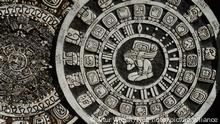 Maya calendar of Mayan or Aztec vector hieroglyph signs and symbols on display at a stand with locally made gifts and souvenirs seen next to the Temple of KukulcÃ¡n (El Castillo) inside the archaeological site of Chichen Itza. On Wednesday, November 17, 2021, in Chichen Itza, Yucatan, Mexico. (Photo by Artur Widak/NurPhoto)