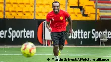 The former Chelsea player Michael Essien training with FC Nordsjaelland in Farum Park, Denmark, Thursday Aug. 20, 2020. The Ghanaian soccer player is in the process of becoming a coach and is therefore participating when U17, U19 and the Superliga team training at FC Nordsjaelland. (Martin Sylvest / Ritzau Scanpix via AP)