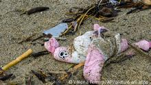 Personal belongings among the wreckage of a capsized boat washed ashore at a beach near Cutro, southern Italy, Monday, Feb. 27, 2023. Rescue crews searched by sea and air Monday for the dozens of people believed still missing from a shipwreck off Italy’s southern coast that drove home once again the desperate and dangerous crossings of migrants seeking to reach Europe. (AP Photo/Valeria Ferraro)