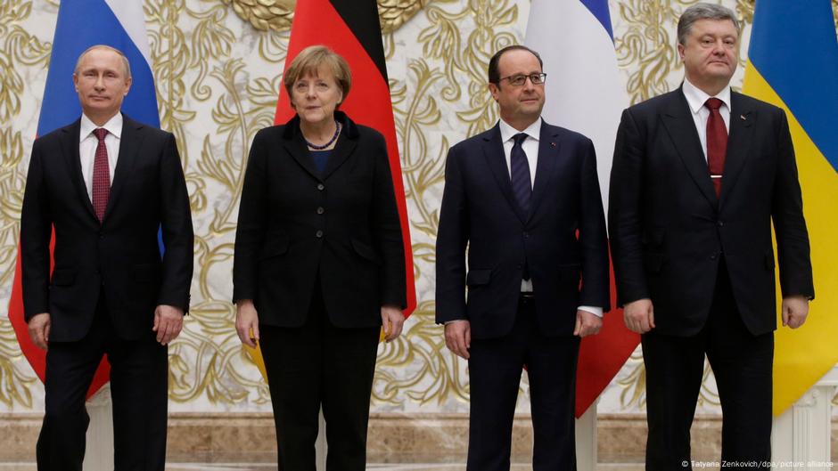 Vladimir Putin, tadašnja nemačka kancelarka Angela Merkel, bivši francuski predsednik Fransoa Oland i tadašnji ukrajinski predsednik Petro Porošenko 2015. godine, nakon potpisivanja sporazuma Minsk II