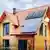 Солнечные коллекторы и солнечные батареи на крыше дома