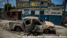 20.04.2023
The shell of a charred police car, set on fire by gang members, sits in the Drouillard slum in Port-au-Prince, Haiti, Thursday, April 20, 2023. (AP Photo/Odelyn Joseph)