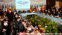 25.04.2023
International delegates attend a conference focused on Venezuela's political crisis, at the San Carlos Palace, also known as the Foreign Ministry, in Bogota, Colombia, Tuesday, April 25, 2023. (AP Photo/Fernando Vergara)