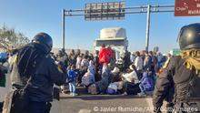 Migrants of various nationalities remain stranded near Tacna, Peru, on April 25, 2023. - Peru mobilized 200 police officers at its border with Chile in response to the arrival of dozens of undocumented Venezuelan and Colombian migrants who say they want to return to their home countries. Peru will ask Chile for official information on the supposed support of Chilean security forces for migrants to cross the binational border through illegal routes, according to a media outlet. (Photo by Javier Rumiche / AFP) (Photo by JAVIER RUMICHE/AFP via Getty Images)