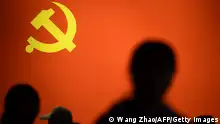 TOPSHOT - This picture taken on October 10, 2017 shows a party flag of the Chinese Communist Party displayed at an exhibition showcasing China's progress in the past five years at the Beijing Exhibition Center.
China's police and censorship organs have kicked into high gear to ensure that the party's week-long, twice-a-decade congress goes smoothly when it begins on October 18. / AFP PHOTO / WANG ZHAO / TO GO WITH CHINA-POLITICS-SECURITY, FOCUS BY BECKY DAVIS (Photo credit should read WANG ZHAO/AFP via Getty Images)