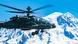Американский боевой вертолет AH-64E Apache летит над заснеженными горами Американский боевой вертолет AH-64E Apache летит над заснеженными горами