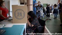 GUATEMALA CITY, GUATEMALA - AUGUST 11: A woman casts her vote during the presidential election in Guatemala City, Guatemala on August 11, 2019. More than eight million Guatemalans head to the polls on Sunday as former first lady Sandra Torres and opinion poll frontrunner Alejandro Giammattei bid to succeed the corruption-tainted Jimmy Morales as president. Fabricio Alonzo / Anadolu Agency
