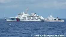 23/04/2023 A Chinese Coast Guard ship with bow number 5201 blocks Philippine Coast Guard ship BRP Malapascua as it maneuvers to enter the mouth of the Second Thomas Shoal locally known as Ayungin Shoal at the South China Sea on Sunday, April 23, 2023. The near-collision was among the tense confrontations encountered by two Philippine government vessels against China, which undertook a weeklong voyage in one of the world's most hotly contested sea passages to assert Philippine sovereignty. (AP Photo/Aaron Favila)