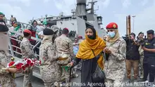 People of different nationalities arrive at Jeddah Sea Port after being evacuated by Saudi Arabia from Sudan to escape the conflicts, Jeddah, Saudi Arabia, April 28, 2023. Saudi Press Agency/Handout via REUTERS ATTENTION EDITORS - THIS PICTURE WAS PROVIDED BY A THIRD PARTY