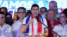 April 30, 2023. Santiago Pena, presidential candidate of the Colorado ruling party, center, talks after the voting closed during general elections in Asuncion, Paraguay, Sunday, April 30, 2023. (AP Photo/Jorge Saenz)