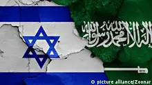 flags of Israel and Saudi Arabia painted on cracked wall