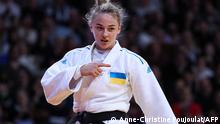 February 4, 2023**Ukraine's Daria Bilodid reacts after winning Portugal's Telma Monteilro (unseen) during the Bronze women's -57kg category at the Paris Grand Slam judo tournament in Paris on February 4, 2023. (Photo by Anne-Christine POUJOULAT / AFP)