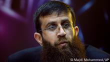 FILE - Palestinian Khader Adnan, an Islamic Jihad spokesman who went on a 66-day hunger strike while he was imprisoned in an Israeli jail, speaks during a television interview in the West Bank city of Ramallah, May 6, 2012. Palestinian prisoner Adnan died in Israeli custody early Tuesday, May 2, 2023, after a hunger strike of nearly three months, Israelâ€™s prison service announced. (AP Photo/Majdi Mohammed, File)