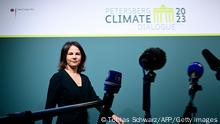German Foreign Minister Annalena Baerbock arrives to address journalists prior to the start of the Petersberg Climate Dialogue (Petersberger Klimadialog), a conference that focuses on laying the groundwork for the COP28 Climate Change Conference in the United Arab Emirates, on May 2, 2023 at the Foreign Office in Berlin. - The more than 40 countries around the table include island states severely affected by climate change, as well as the largest emitters of CO2. The COP28 UN climate change conference is scheduled to take place from November 30 to December 12, 2023 in the United Arab Emirates. (Photo by Tobias SCHWARZ / AFP) (Photo by TOBIAS SCHWARZ/AFP via Getty Images)