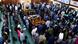 Ugandan members of parliament stand as they participate in the vote Ugandan members of parliament stand as they participate in the vote