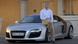 Экс-глава Audi Руперт Штадлер на фоне автомобиля Audi R8 Экс-глава Audi Руперт Штадлер на фоне автомобиля Audi R8