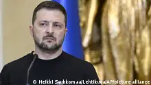 Ukrainian President Volodymyr Zelenskyy reacts during a press conference of the Nordic-Ukrainian Summit at the Presidential Palace in Helsinki, Finland, Wednesday May 3, 2023. Zelenskyy is in the Finnish capital, Helsinki, for a one-day Nordic summit. (Heikki Saukkomaa/Lehtikuva via AP)